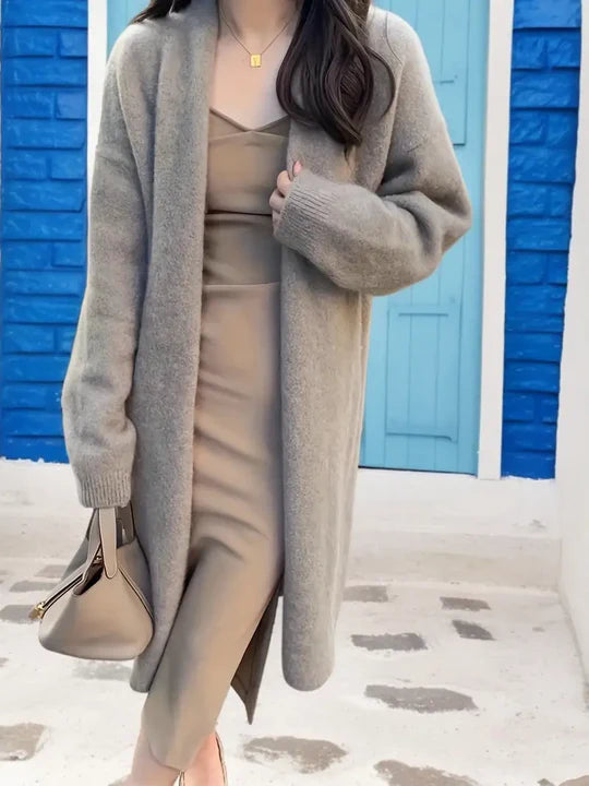 Warme lange Strickjacke mit lockeren Ärmeln für Damen